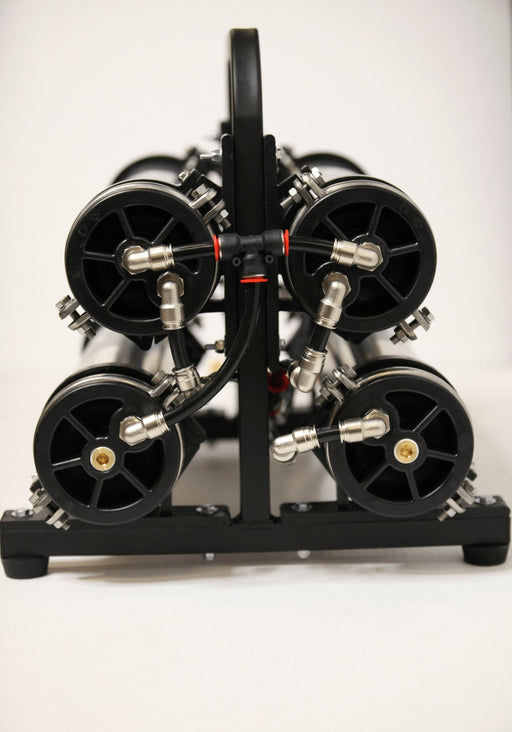 Tucker Compact 4-stage RO/DI system end view showing four housing caps and carry handle