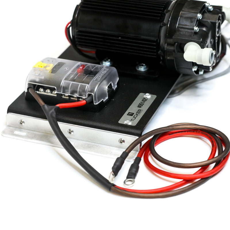 Tucker 12V RO booster panel angled view of the pump, fuse block and red power leads