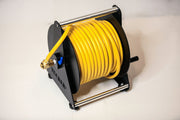 Tucker hand carry hose reel loaded with yellow hose, three-quarter