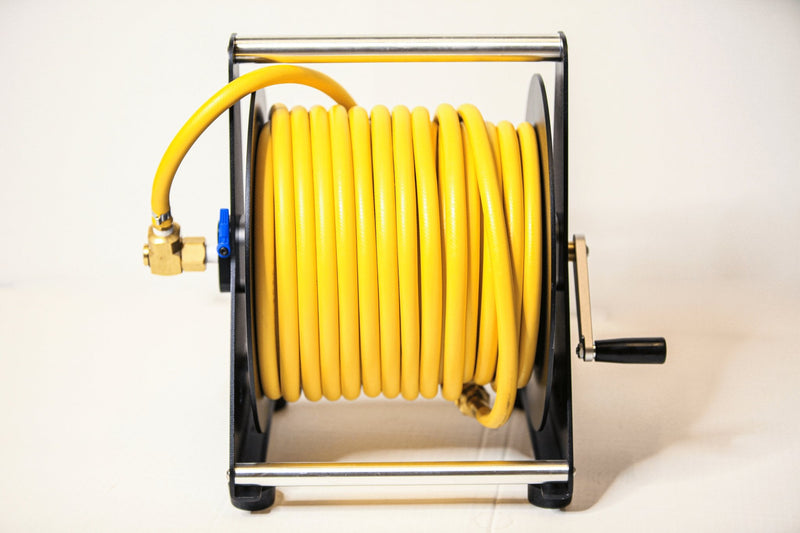 Tucker hand carry hose reel loaded with yellow hose, front