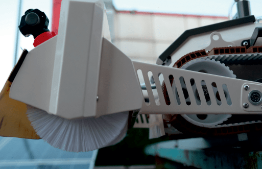 Tucker RTM solar robot close-up of the brush hood and track side arm