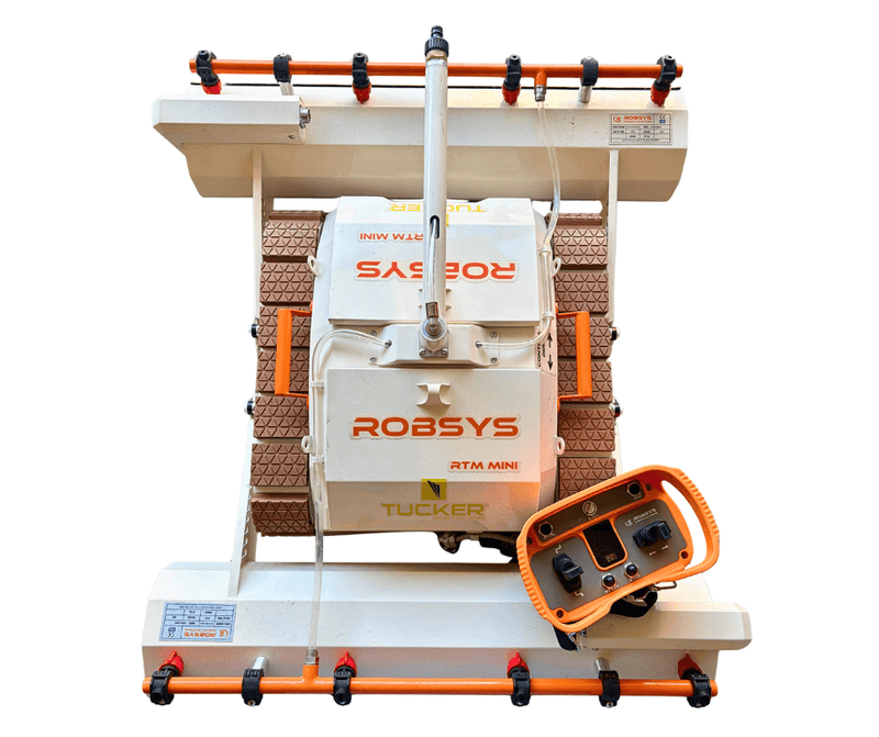 Tucker RTM MINI solar cleaning robot on its carry frame with the orange remote control