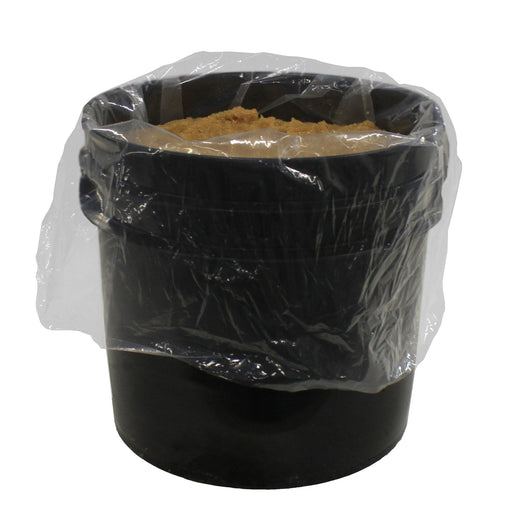 Tucker DI resin beads in an open black bucket with a clear liner bag
