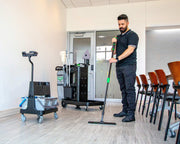 Unger DeepCleanRx Janitorial Cart System, mopping an office floor
