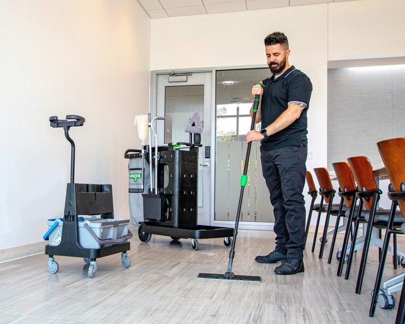 Unger DeepCleanRx Janitorial Cart System, mopping an office floor