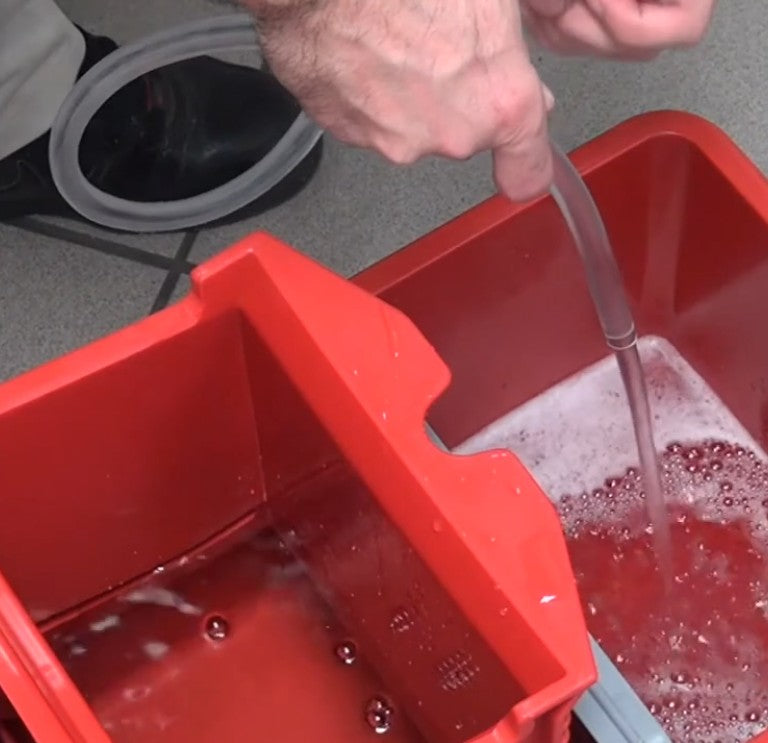 Unger Easy Adapter Hose, filling a mop bucket with the hose