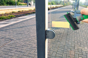Unger ErgoTec Plastic Blade, scraping a glass door with a plastic blade