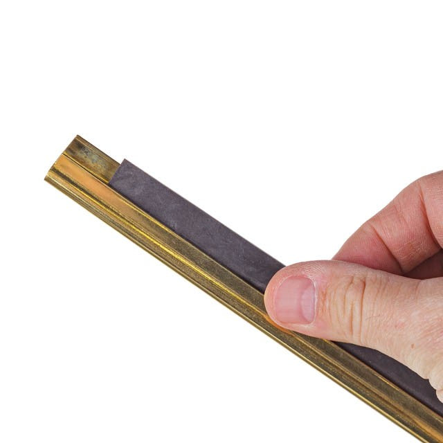 Unger GoldenClip/GoldenPRO Brass Channels, channel with rubber in hand