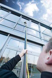Unger HiFlo nLite HiMod Carbon Poles, cleaning a glass facade
