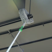 Unger High Access Dusting Kit, dusting a ceiling fixture with the fan duster on a pole