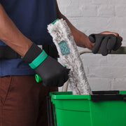 Unger Neoprene Gloves, gloved hand lifting a window washer from a bucket