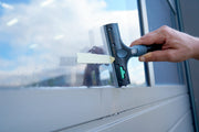 Unger Ninja Plastic Blade, scraping a window with a plastic blade