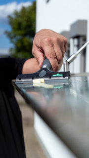 Unger Ninja Plastic Blade, scraping a glass edge with a plastic blade