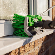 Unger nLITE Radius Brush 11"/28cm, scrubbing a window sill