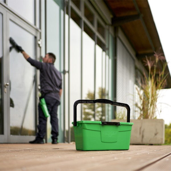 Unger Pro Bucket 3-Gallon, window cleaner working beside the bucket