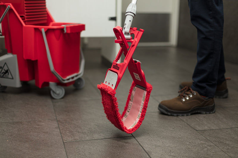 Unger Restroom Complete Mop Pack, wringing the mop pad