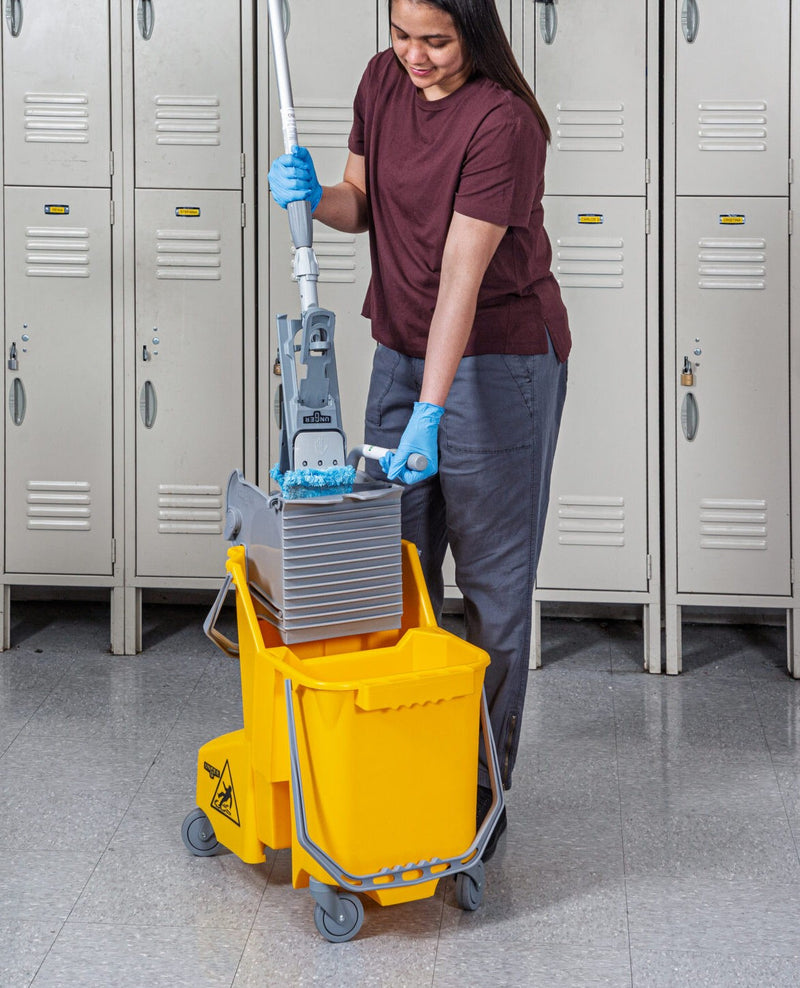 Unger Dual Compartment Mop Buckets, wringing a mop in the yellow bucket