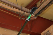 Unger StarDuster Pipe Brush, dusting an overhead pipe