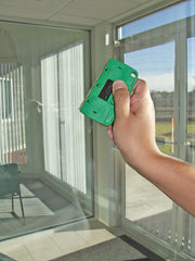 Unger Starter Pro Window Cleaning Kit, scraping glass with the ProTrim scraper