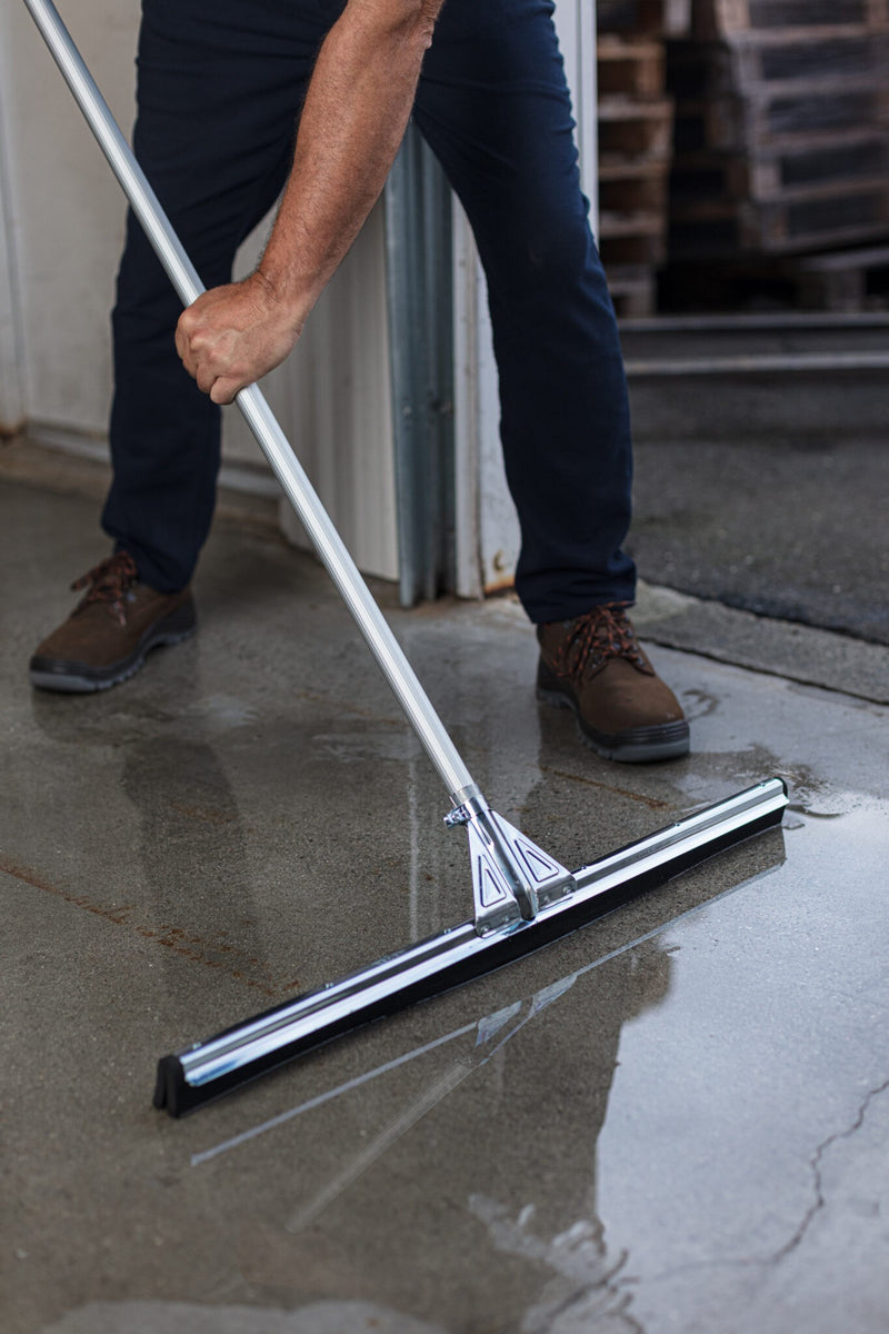 Unger WaterWand Floor Squeegee Heavy Duty, drying a wet floor